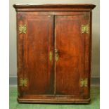 An 18th century walnut veneered corner cupboard enclosing shelves, 36 by 85 by 70 wide.