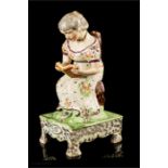 A Victorian Staffordshire figure titled 'Vilage Maid' 25cm high.