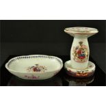 A Chinese brush holder 10cm high, and dish, both bearing coats of arms, 12cm high.