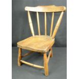 An oak country child's chair, with spindled back, 49 by 26 by 23cm.