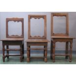 Three 17th century oak child's chairs, with open backs, the largest 66cm high.