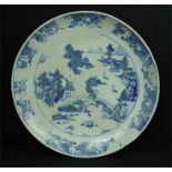 A large Chinese blue and white charger depicting landscape, 53cm diameter.