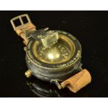 A WWI Royal Flying Core wrist compass.