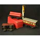 A group of tin plate railway wagons including Hornby.