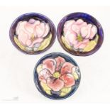 Three Moorcroft dishes, in the Anemone pattern.