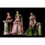 Royal Doulton figurines; Queen Victoria HN3125, Queen Anne HN3141, a Hostess of Williamsburg HN2209,