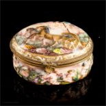 A Capo di Monte trinket box, modelled and painted with horses and cherubs, 7½ by 5½ by 4½cm.