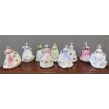 A group of nine Coalport and Royal Worcester figurines.