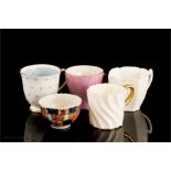 A group of coffee cans to include Shelley, Susie Cooper, Coalport, and a Chinese tea bowl.