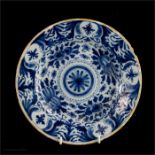 A blue and white 18th century Delft plate.