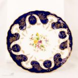 A Coalport MD&S Ltd plate, hand painted with flowers, marked 2300 B2B15.
