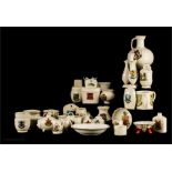 A group of 32 pieces of WH Goss crested ware.