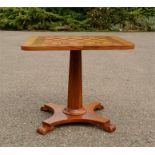 A bespoke mahogany pedestal chess table.