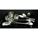 A group of silver to include spoons, napkin rings etc.