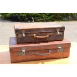 Two leather suitcases.