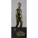 Houdon, a bronze figure of Diana the Huntress, signed to the base, 61cm high.