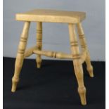 A pine country stool, with H-form stretcher together with a tall pine stool with pierced top. (2)