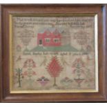 A Victorian sampler by Sarah Bayley, her work aged 11 years, 1840, depicting house with dog in the