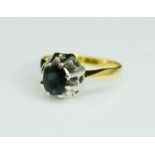 An 18ct gold and sapphire solitaire, 3.16g.