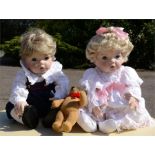 Two porcelain dolls.