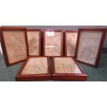 A set of porcelain relief modelled Victory plaques, in glazed mahogany frames.