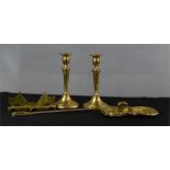 A group of brassware to include a pair of Harrison candlesticks circa 1820, stamped with H to