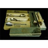 A group of four silver spoons, Goldsmiths & Silversmiths London, each boxed, and together with a