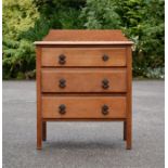 A small chest of three drawers.