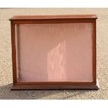 A mahogany glazed display cabinet with shelved interior.