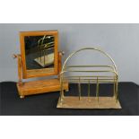 A Victorian toilet mirror and a brass magazine rack.