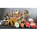 A quantity of foreign collectors dolls, each dressed in traditional attire.