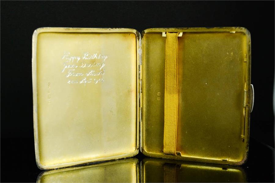 A silver cigarette case, machine engraved decoration, and a gilt interior, 4.04toz. - Image 2 of 3