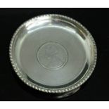 A silver ashtray inset with One Indian Rupee dated 1877, 1.77toz.