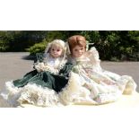 Two porcelain dolls.