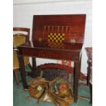 A Georgian mahogany three fold table; tea table, card table and chess table.