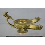 A brass oil lamp, with twin branch.