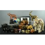 A quantity of model elephants of various style and form.