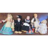 A group of early foreign collectors dolls.