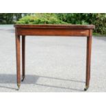 A 19th century card table, with green baise lined interior.