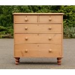 A pine chest of drawers, two over three long graduated drawers.