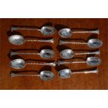 A group of ten silver spoons, of scallop form, 4toz.