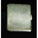 A silver cigarette case, machine engraved decoration, and a gilt interior, 4.04toz.