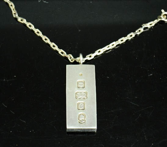 A silver ingot pendant, 1.4toz.