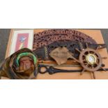 A group of items to include African cane, carvings, Arabian head, taxidermi fish, ships wheel,