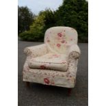 A floral upholstered armchair.