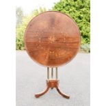 A 19th century rosewood inlaid circular top table, the dished tilt top inlaid with love birds, the