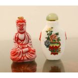 Two Chinese snuff bottles, one in the form of a Buddha.