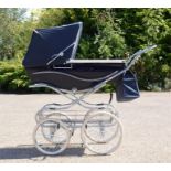 A Silver Cross Kensington Pram. together with original certificate of authenticity, and accessories.