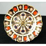 A Royal Crown Derby plate, scalloped edge, Old Imari pattern.