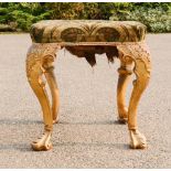 A giltwood carved stool, 51cm high.